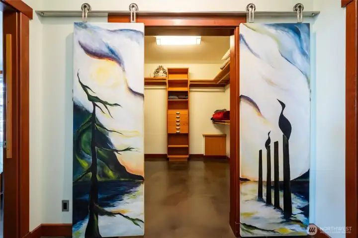 The hand painted shoji-style doors from the primary suite lead to the oversized walk-in closet. The hand painted shoji-style doors from the primary suite lead to the oversized walk-in closet.