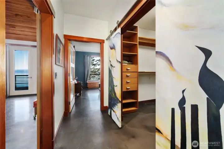 Another view of the walk-in closet off the primary suite with the incredible views beyond. Another view of the walk-in closet off the primary suite with the incredible views beyond.