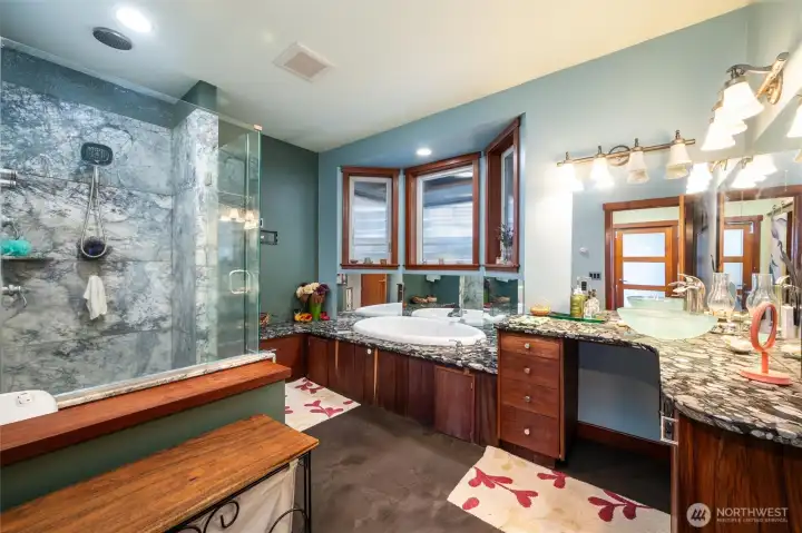 The bath on the lower level has an incredible steam shower sauna that is made of marble that was reclaimed from Western Washington University. The bath on the lower level has an incredible steam shower sauna that is made of marble that was reclaimed from Western Washington University.