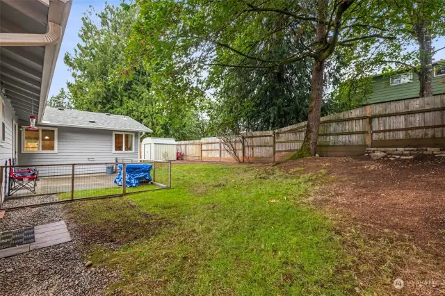 Brand new fencing on along the two longest sides of the yard. There is sizable space on both sides of the house as well.