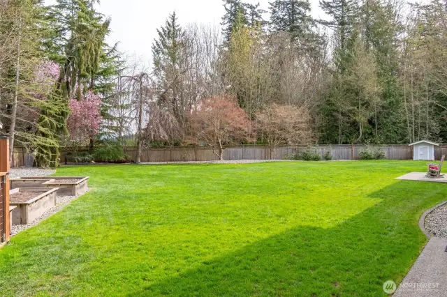 The yard is fully fenced and includes a full sprinkler system.