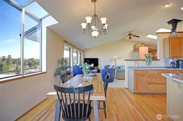 Natural oak hardwood floors in kitchen and dining area...