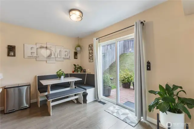 Eat-in kitchen offers access to back deck and fully fenced yard.