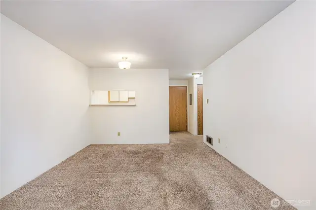 Living room looking towards dining room and entrance