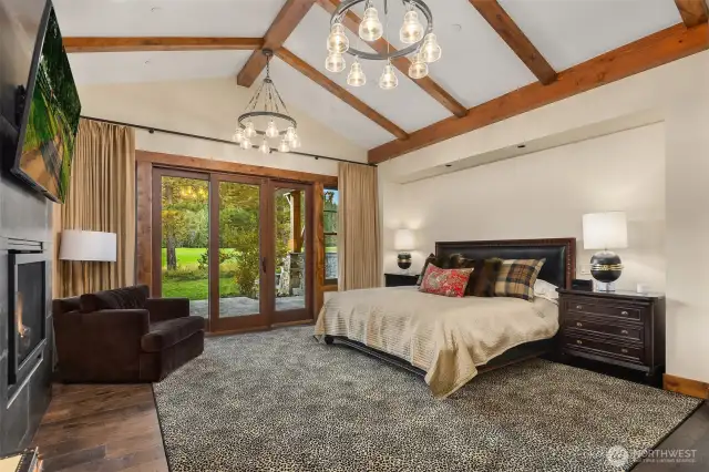 Primary Wing on Main Level, complete with gas fireplace & own terrace.