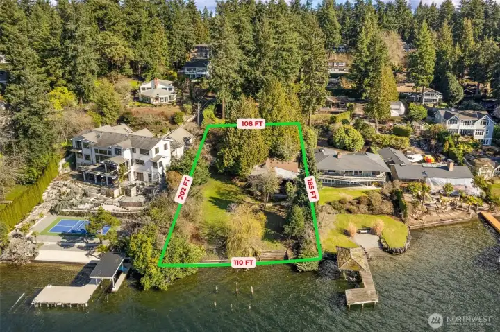Expansive ½-acre Lake Washington waterfront lot with 110 ft of shoreline—ideal for a luxury custom home.
