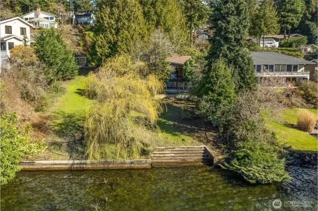 Notice the concrete Bulkhead with stairs leading to the water.