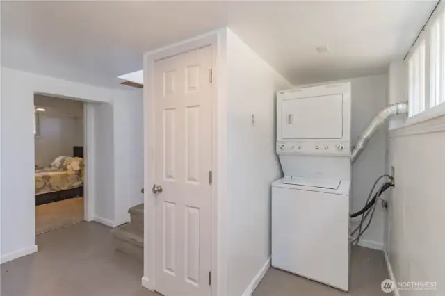Enter the fully finished basement from the house or separate entrance, featuring laundry and storage.