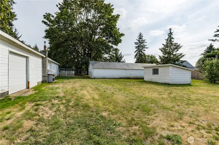 Behind the garage & barn