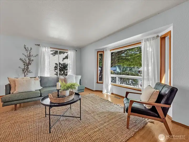 Foyer opens to living room to the right