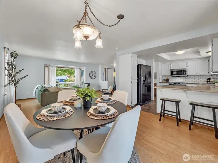 Open concept to kitchen and living from the dining room