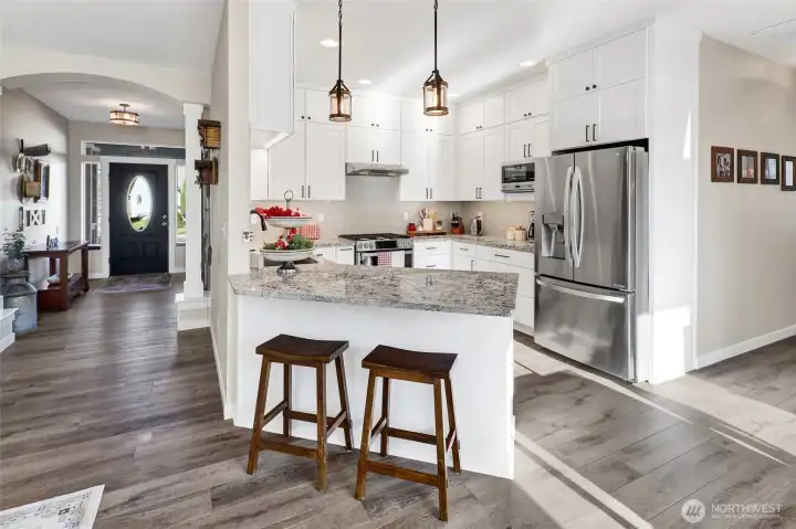 This is the kitchen everyone gathers in—completely reimagined with elevated finishes, clean lines, and a timeless Pacific Northwest aesthetic.
