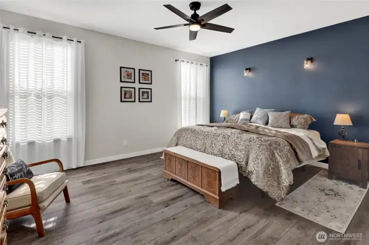 Escape to your spa-inspired primary suite, complete with walk-in closet and seaside inspired charm.