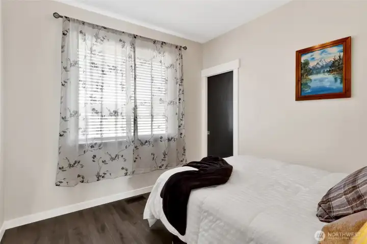 Bedroom 4 overlooks the side yard & also features a walk in closet.