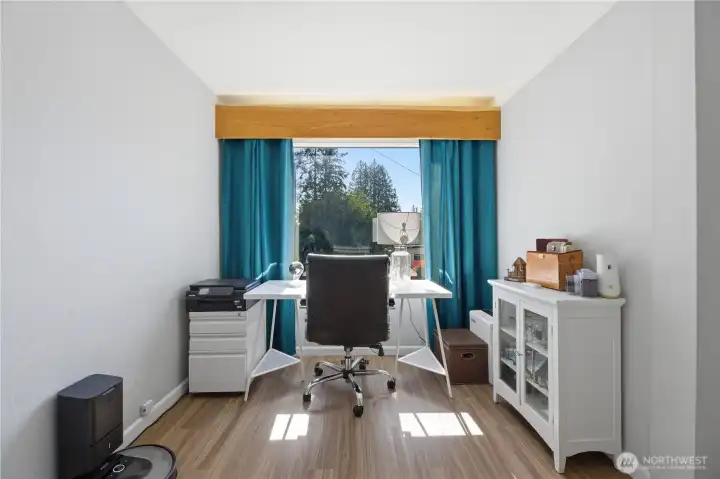 Office nook at front of home with lake view
