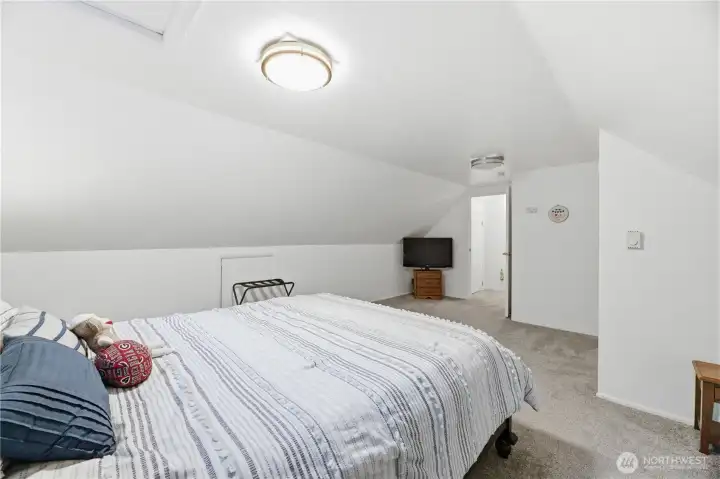 Spacious upstairs bedroom could be primary suite