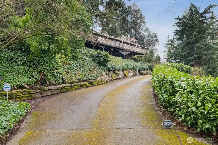 A sweeping driveway draws you away from the street and provides a true sense of retreat as you arrive home.