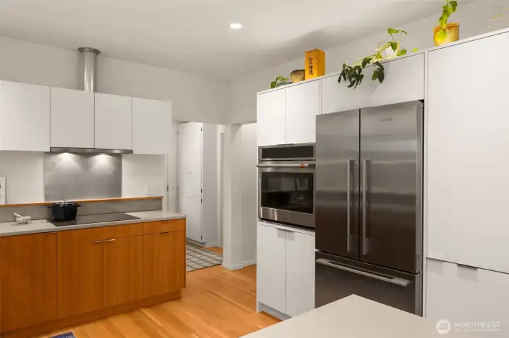 Kitchen features: Induction cooking, dedicated coffee bark, custom cabinetry and new Fir floors.