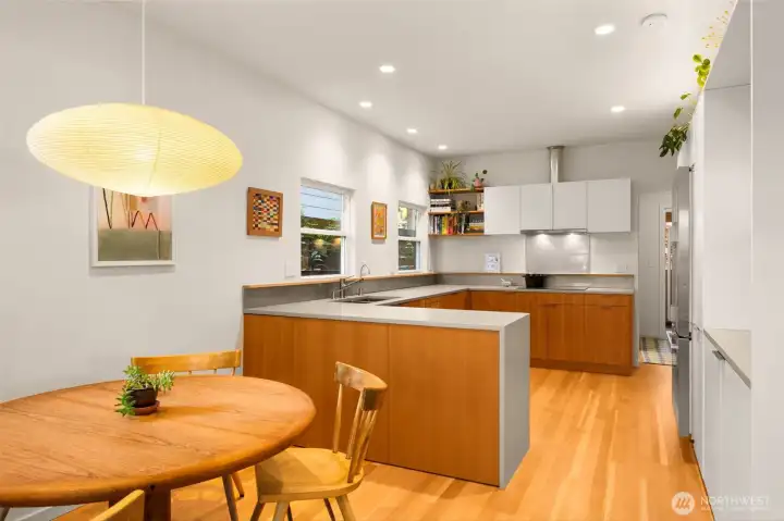 Kitchen flows into the spacious dining room.