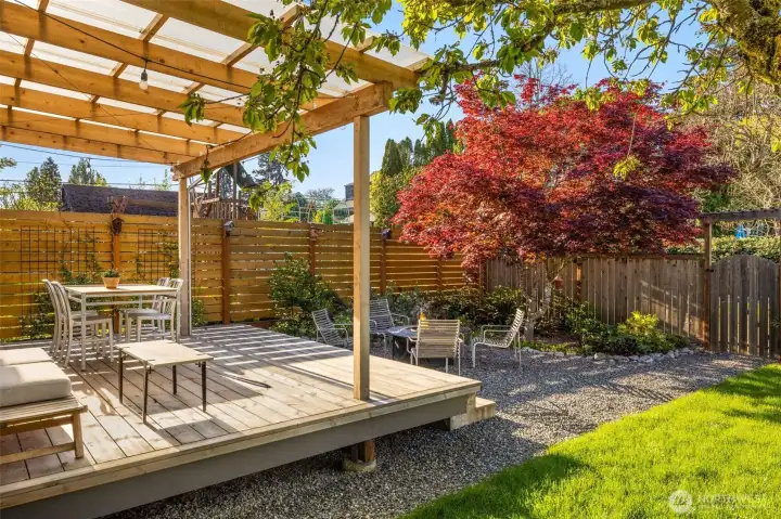 Large covered deck and new gravel path and patio
