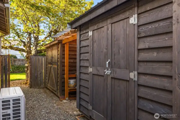 2 storage sheds, plus a potting shed on the side of the property.