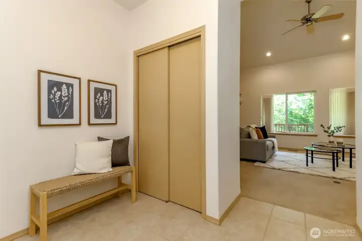 Front entry. Coat closet & livingroom ahead. Office/playroom to the right.