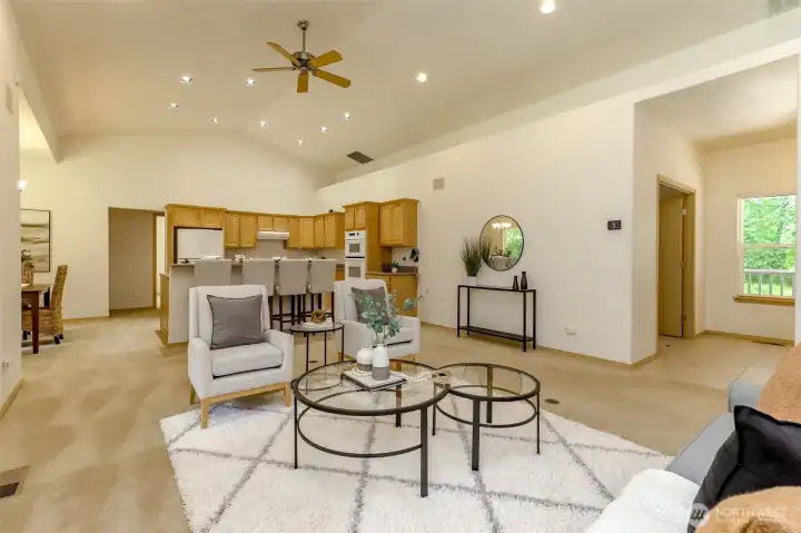 Livingroom, showcasing recessed lighting & celing fan.
