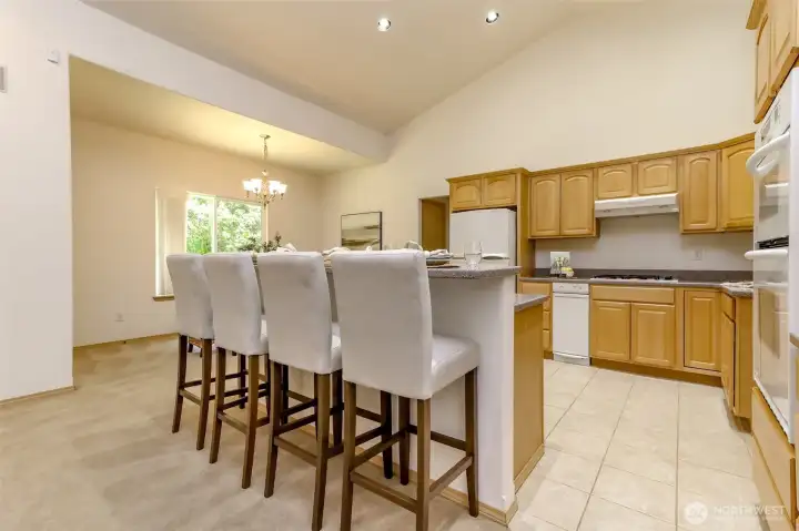 Kitchen island seamlessly blends cooking, dining and entertaining