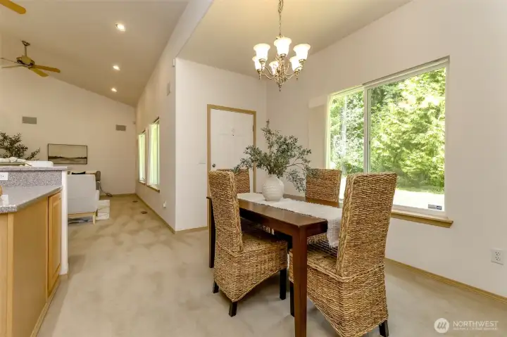 Door in dining room leads out to a cozy back deck looking out to back yard. Relax &/or entertain with this easy flow.