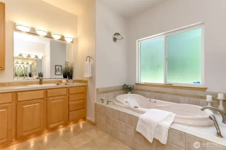 Look for the beautiful lighting in this spa inspired suite and also in the kitchen. Such pretty details.