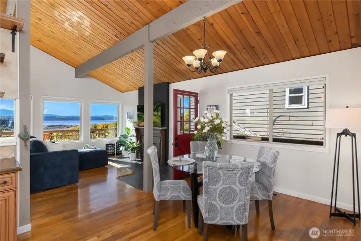 Even from the dining area, expansive windows keep the stunning Hood Canal and Olympic Mountain views front and center. Even from the dining area, expansive windows keep the stunning Hood Canal and Olympic Mountain views front and center.