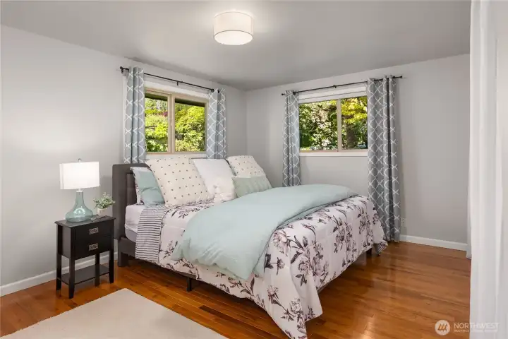 The primary bedroom offers a comfortable retreat with direct access to the updated three-quarter bath, thoughtfully designed with a second entrance for guests and everyday convenience. The primary bedroom offers a comfortable retreat with direct access to the updated three-quarter bath, thoughtfully designed with a second entrance for guests and everyday convenience.