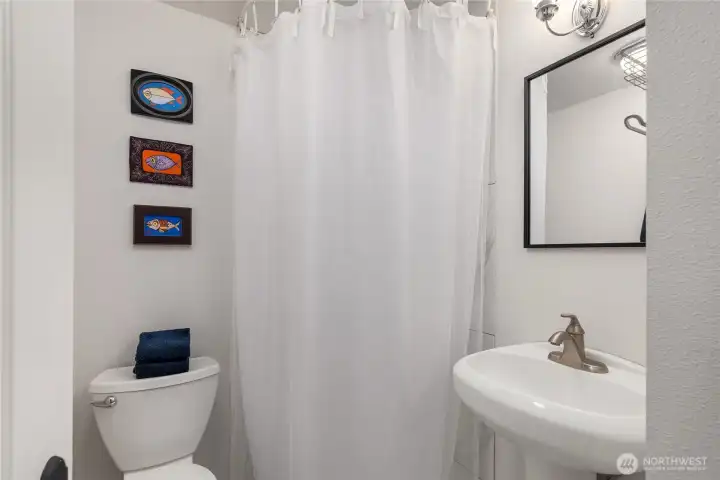 The second bath features a space-saving corner shower and a smart, efficient layout designed to maximize comfort and functionality. The second bath features a space-saving corner shower and a smart, efficient layout designed to maximize comfort and functionality.
