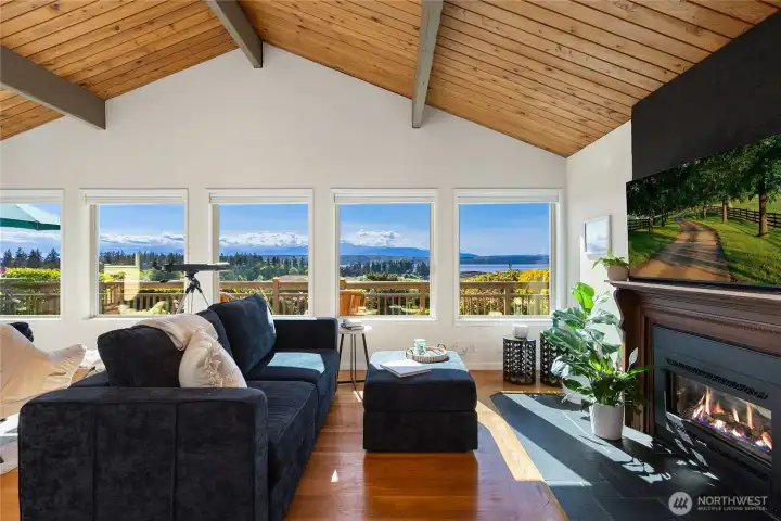 The great room was thoughtfully designed to capture the sweeping west-facing Hood Canal and Olympic Mountain views from nearly every angle. The great room was thoughtfully designed to capture the sweeping west-facing Hood Canal and Olympic Mountain views from nearly every angle.