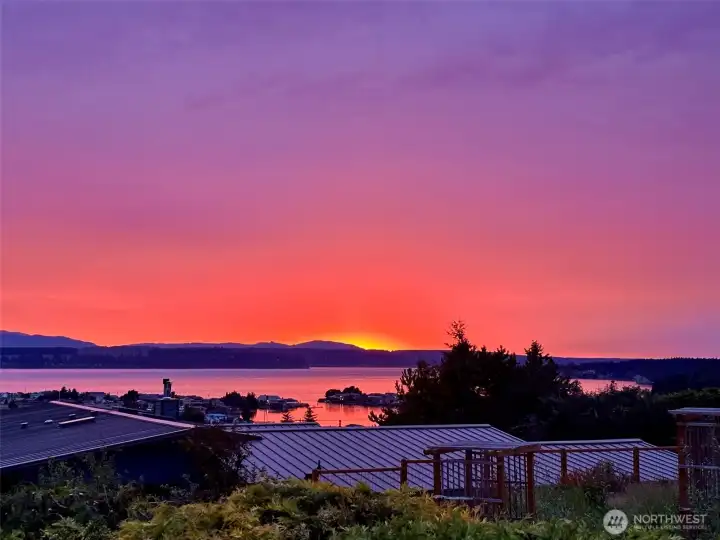 One last breathtaking glimpse as the sun sets and the sweeping coastal panorama fades into the peaceful evening light. One last breathtaking glimpse as the sun sets and the sweeping coastal panorama fades into the peaceful evening light.