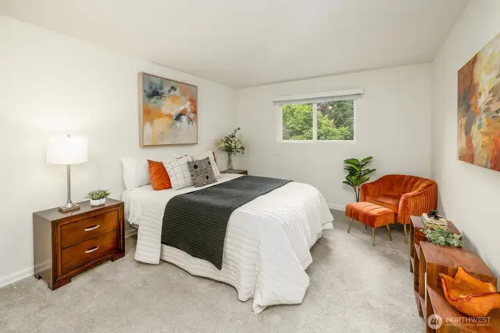 Spacious primary bedroom with large closet.
