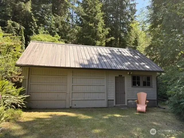 Spacious detached garage providing shop space, secure storage and covered parking.
