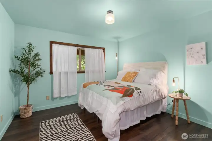 Down stairs bedroom across from bathroom.