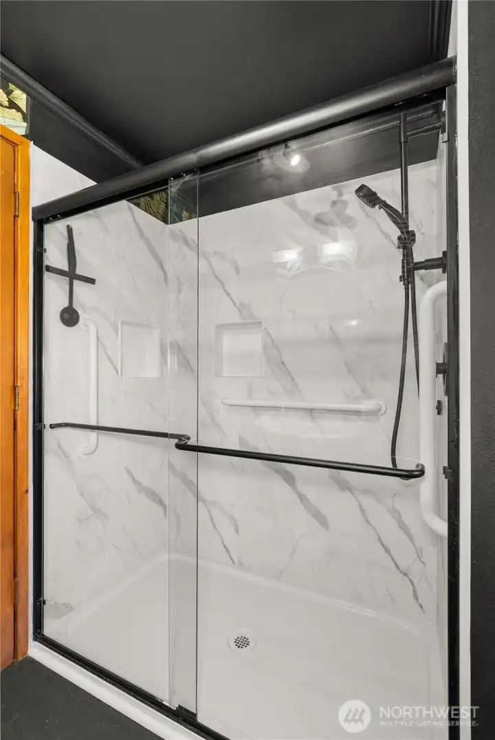 Walk-in shower on main level.