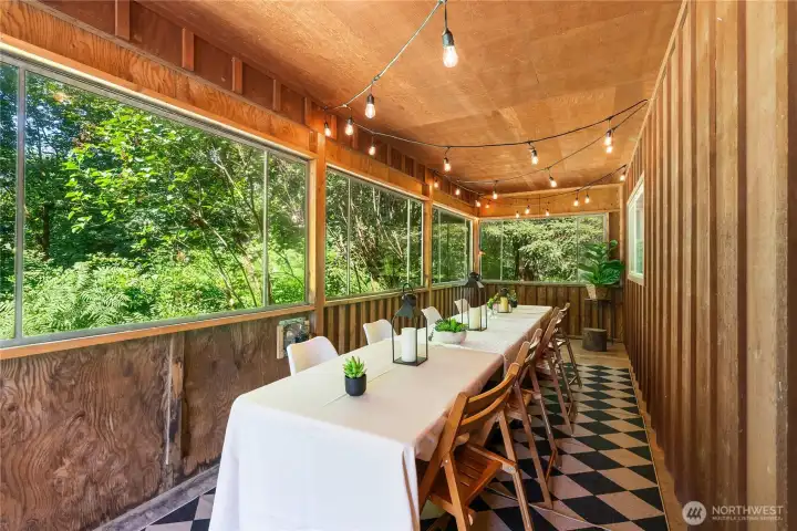 Large sunroom provides some passive heating of the house in the winter and a wonderful space to host.