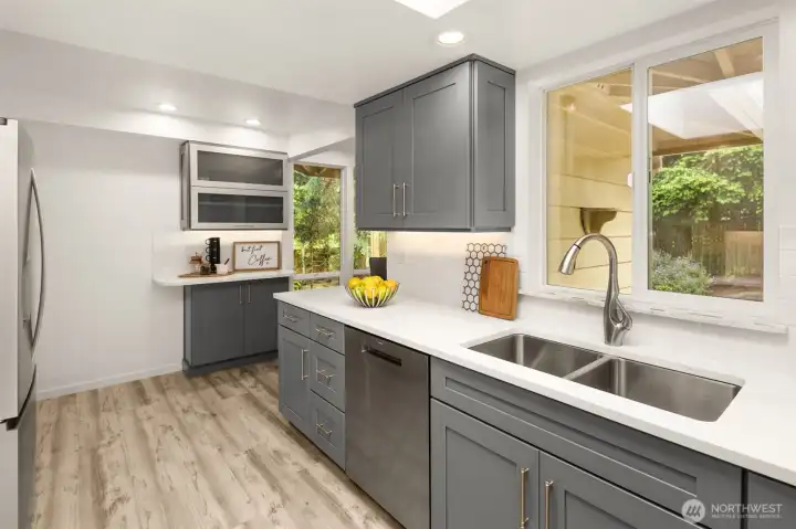 Additional custom cabinetry creates exceptional storage and workspace. Additional custom cabinetry creates exceptional storage and workspace.