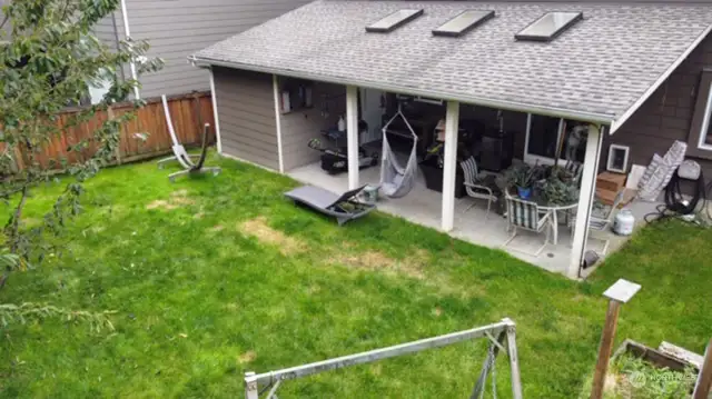 Backyard featuring covered back patio