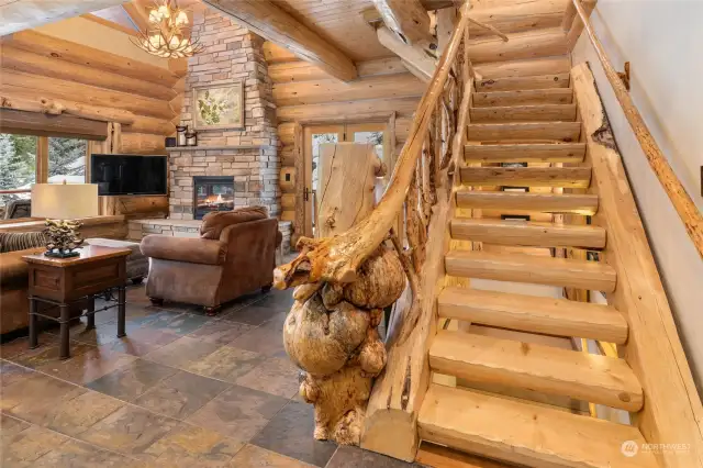 Custom railing built with wood found on the property.