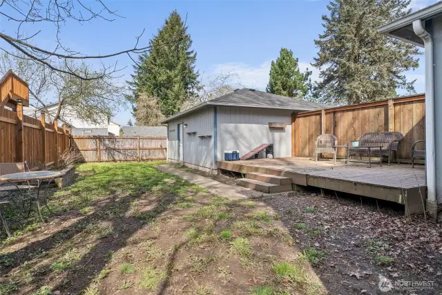 1408 larger fenced backyard w/ private garage access