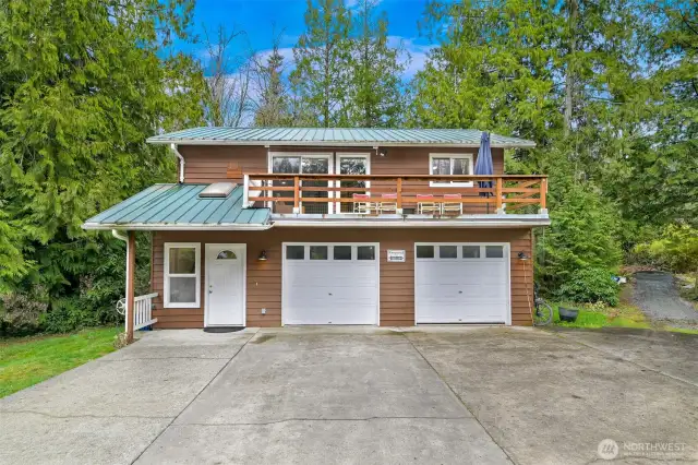 The ADU!  2 bedrooms and a full bathroom with deck and 2 car garage