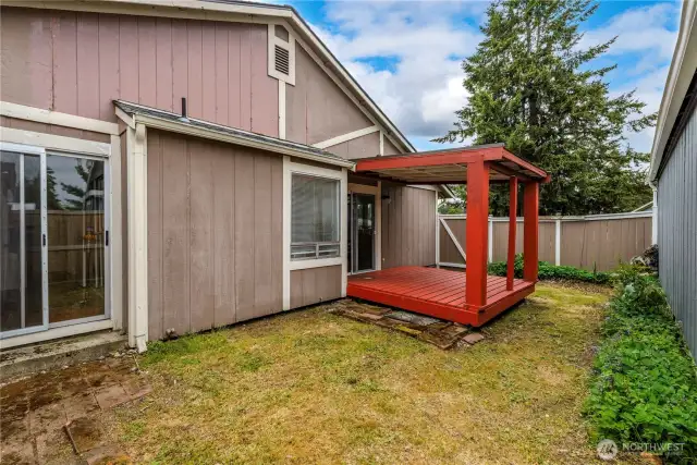 Easily maintainable yard, looking for a little love to make it shine.