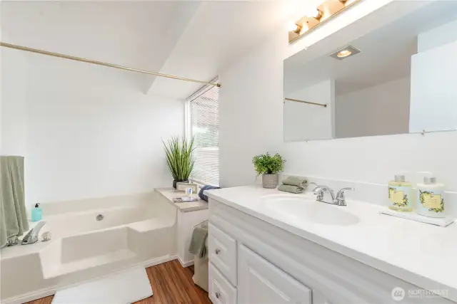 Primary bath with a great soaker tub.  Not a tub person?  Replace with a large walk-in shower.