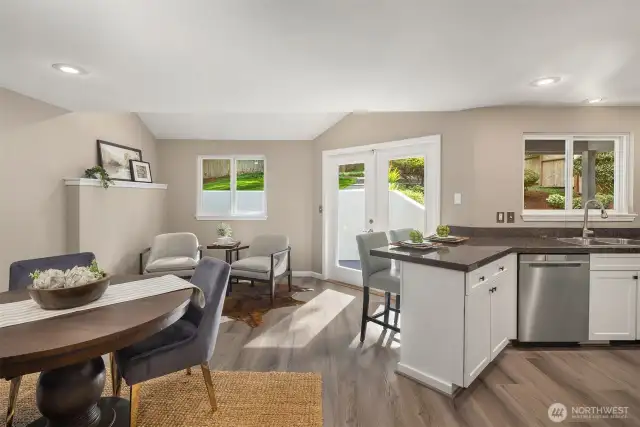 Versatile bonus space off kitchen: dining or entertainment