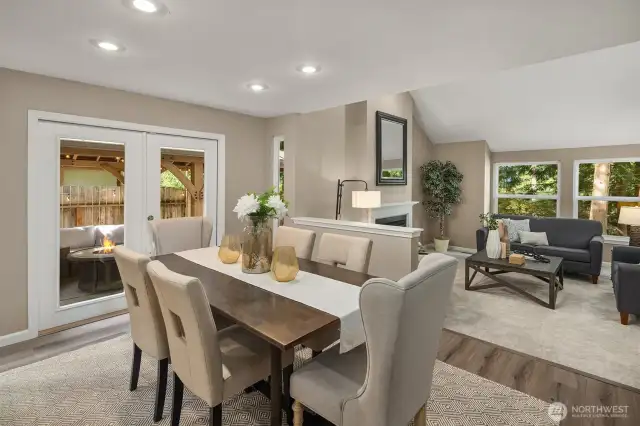 French doors lead to side-yard covered outdoor space