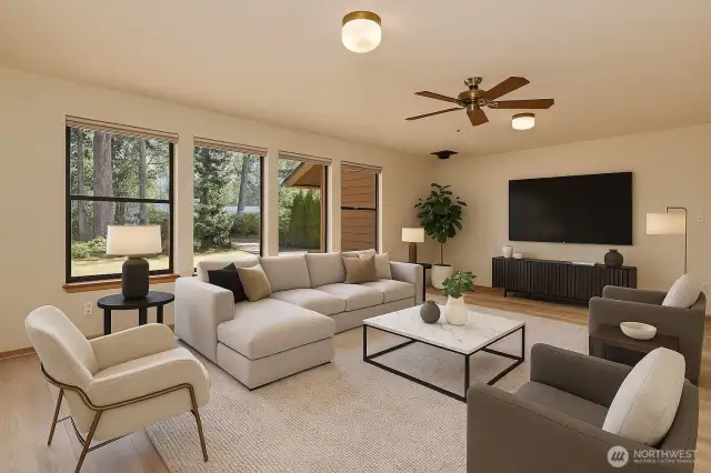 The second living room with brand new Luxury Plank Vinyl flooring. Virtually Staged.